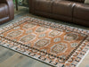 Qaabiz Area Rug